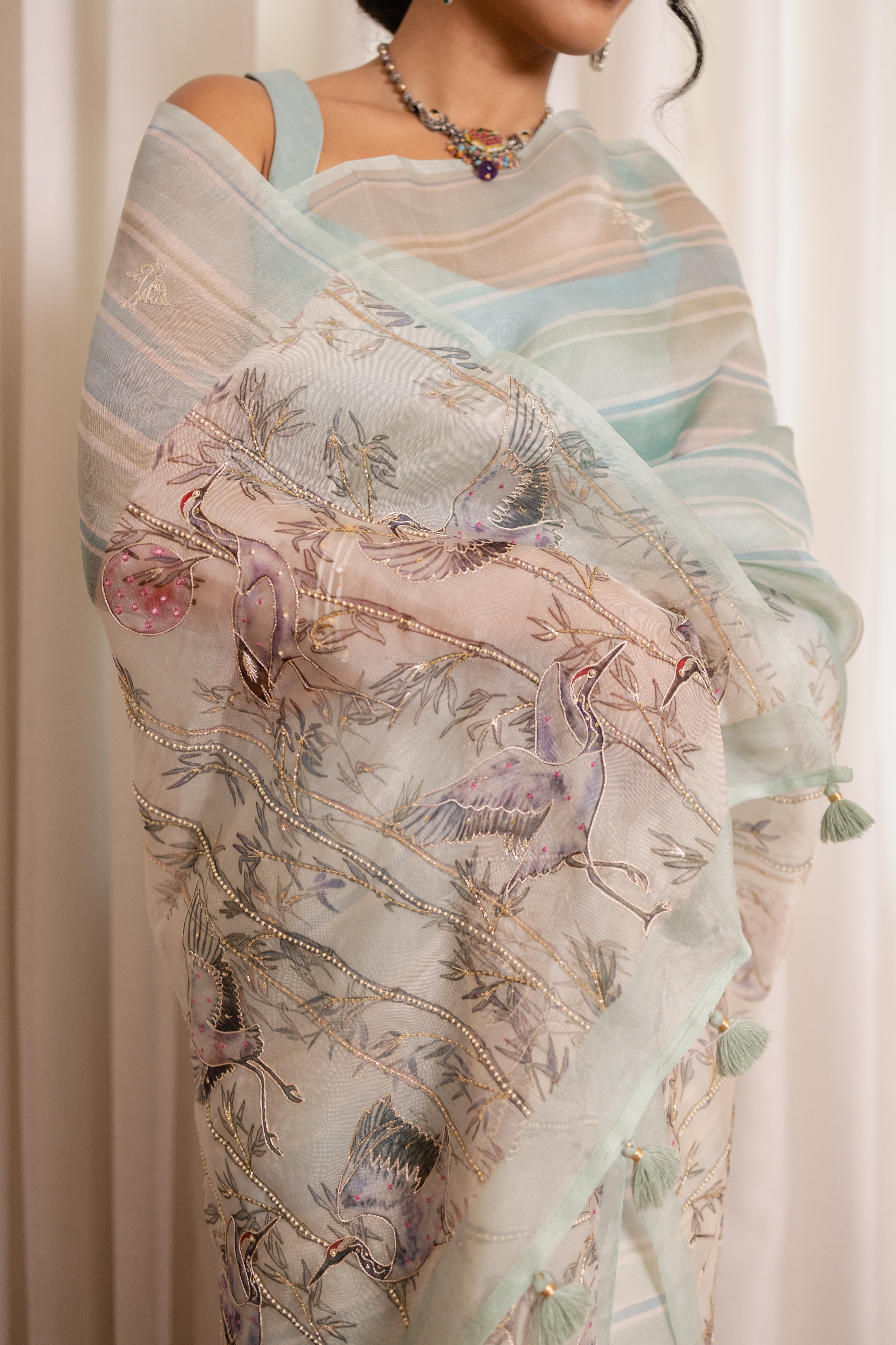 Pastel Heron Print Organza Silk Saree with Zardozi Accents