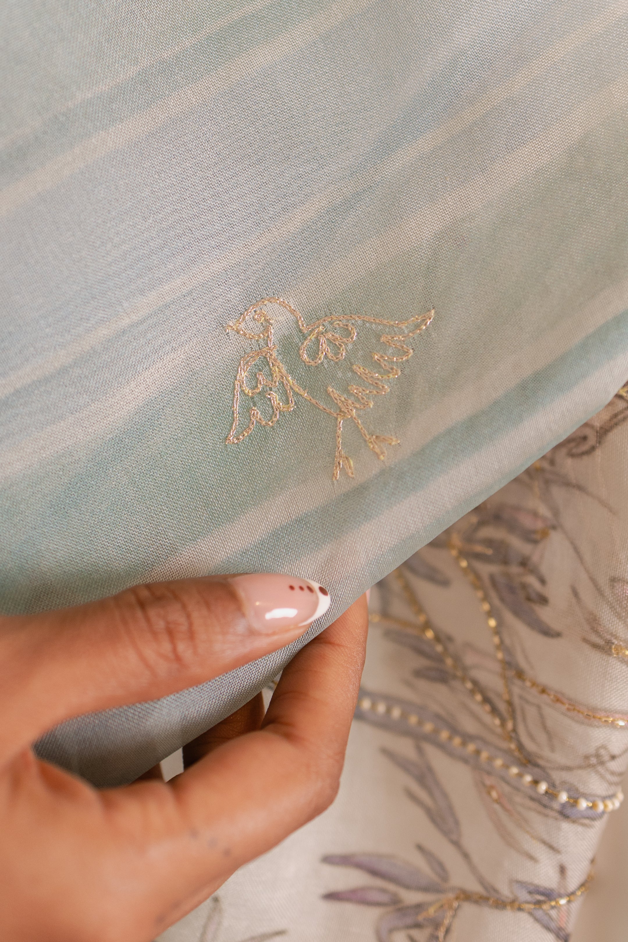 Pastel Heron Print Organza Silk Saree with Zardozi Accents