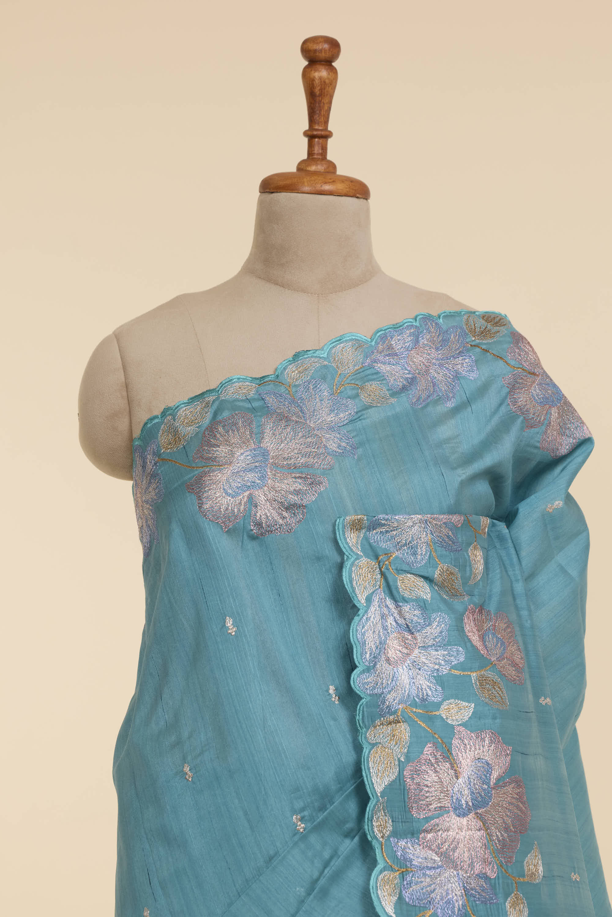 Scallop Border Semi Raw Silk Teal Blue Colour Saree With Floral Embroidery Work Border